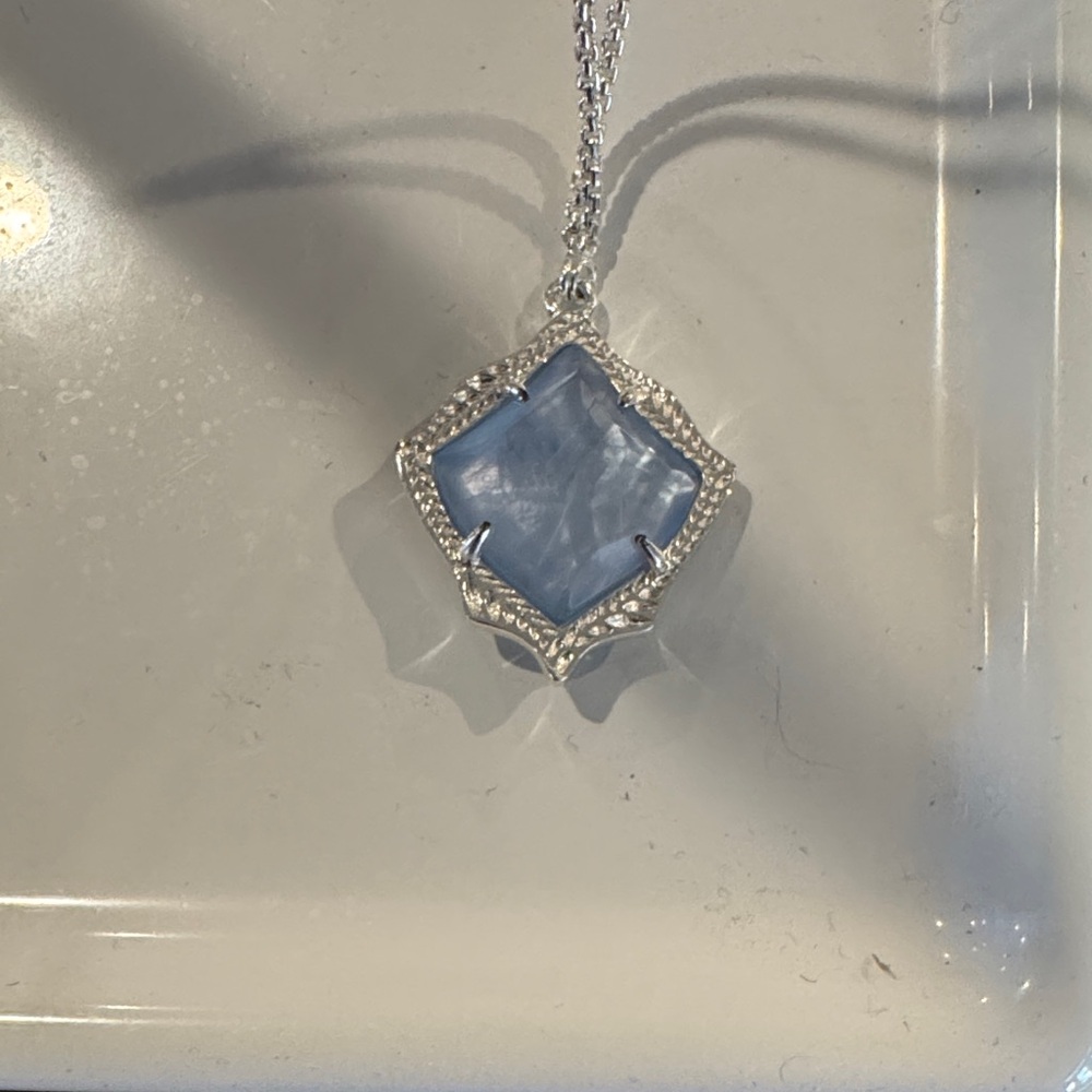Elegant Silver and Blue Pendant Necklace
